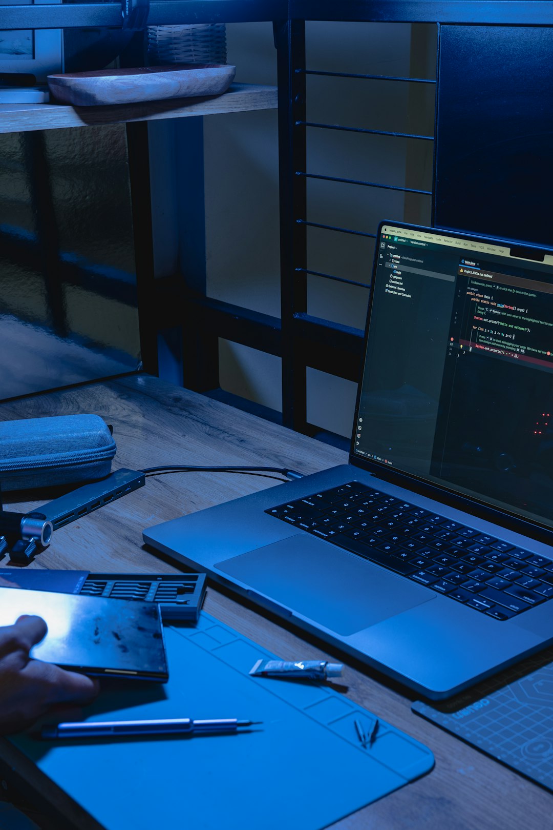services-01 Precision and logic come to life on a laptop displaying programming code in a focused workspace. A powerful representation of software engineering, problem-solving, and cutting-edge digital solutions.